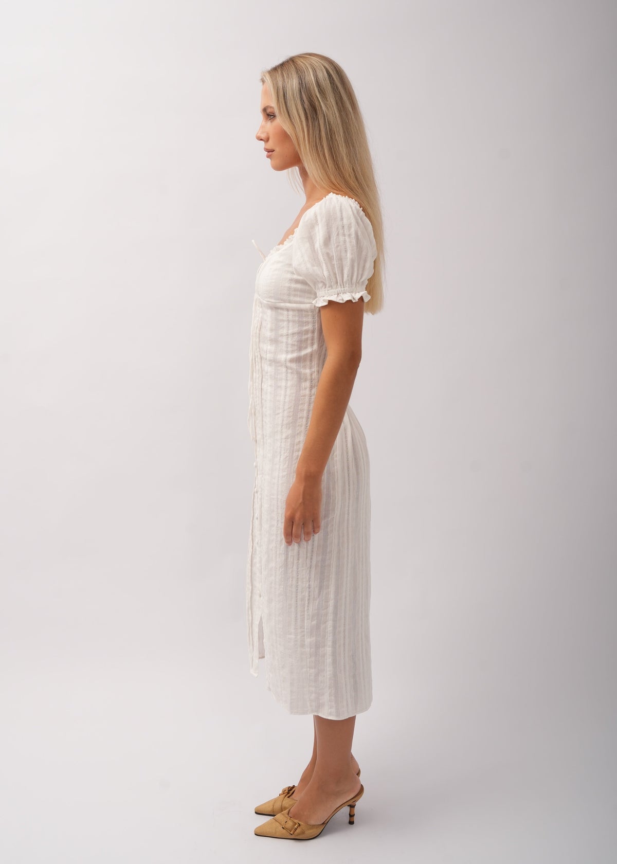 Tara & Gaia Iris Midi Dress in Ivory - side view on model Julia