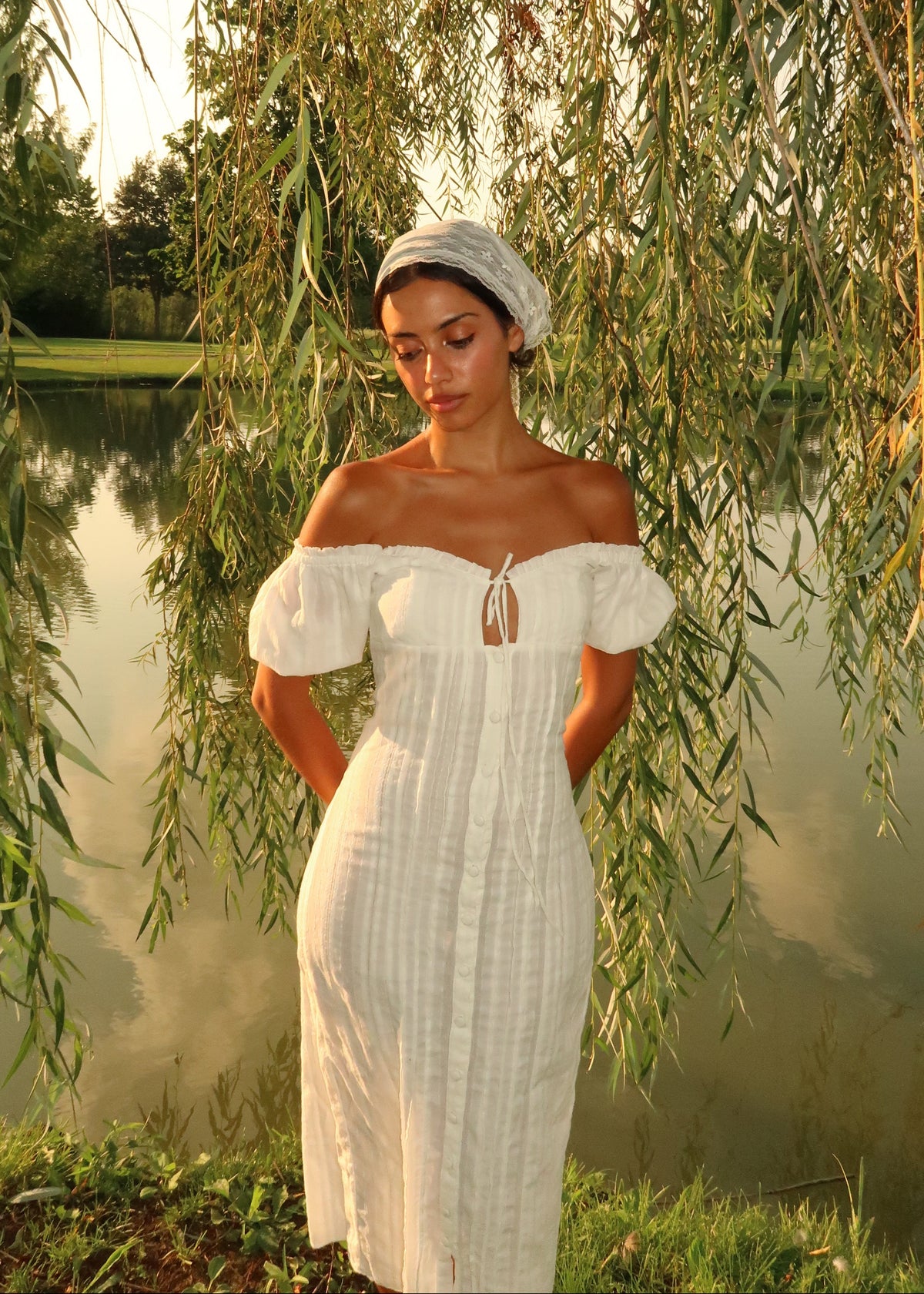 Tara & Gaia Iris Midi Dress in Ivory - front view on model Tara