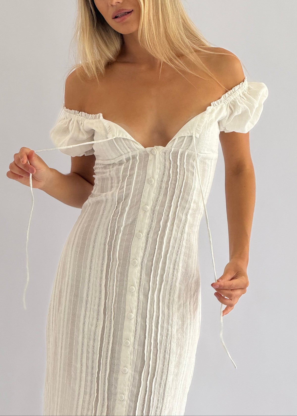 Tara & Gaia Iris Midi Dress in Ivory - details view on model Julia